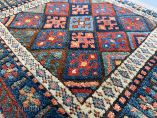 Late 19th century Kurdish Jaf bag face, that has been sewn onto a hessian wrapped wooden frame.   This can be hung on a wall as a piece of rug art.

The  ...