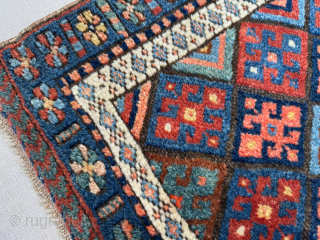 Late 19th century Kurdish Jaf bag face, that has been sewn onto a hessian wrapped wooden frame.   This can be hung on a wall as a piece of rug art.

The  ...