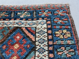Late 19th century Kurdish Jaf bag face, that has been sewn onto a hessian wrapped wooden frame.   This can be hung on a wall as a piece of rug art.

The  ...