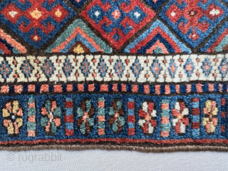 Late 19th century Kurdish Jaf bag face, that has been sewn onto a hessian wrapped wooden frame.   This can be hung on a wall as a piece of rug art.

The  ...