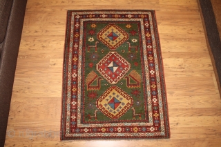 Antique Kazak rug, Caucasus, Late 19th Century 4'4 x 3'1 ft. 1.32 x .94m  In good condition and rare in this green colour! SOLD        