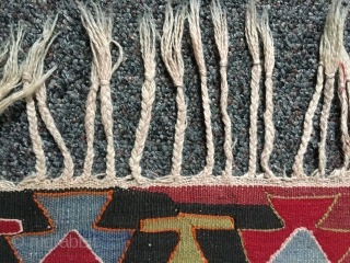 Large Turkish Kilim rug c. 1900. Vibrant colors, some small repairs as pictured in 4th photo. Braided fringe. Clean and odor-free, includes tags from professional cleaner and art gallery where purchased. 

5'9"  ...