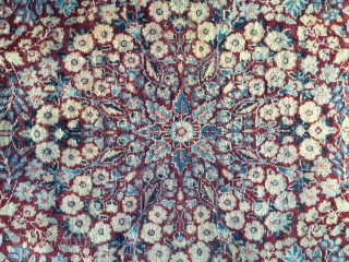 Believe to be very early 1900s. Hand-woven, multi-color floral design with three borders. Good condition, professionally cleaned. Worn along the edge, rim and margin border shows wear.

Measures W 4' 6", L 7'  ...