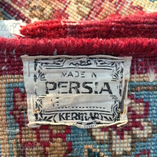 Believe to be very early 1900s. Hand-woven, multi-color floral design with three borders. Good condition, professionally cleaned. Worn along the edge, rim and margin border shows wear.

Measures W 4' 6", L 7'  ...