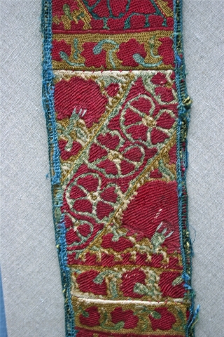 A very good circa 1850 Karakalpak  (Uzbekistan),  silk embroidered sash, that was used in a headdress.  Silk on cotton, and it was originally made like this, woven in short  ...