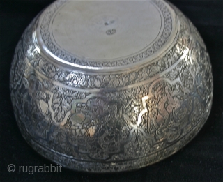Sterling Silver 19th c. Persian Bowl
Hand Engraved / circa 1870 - 1890 / ?
Size; 5" x 2&1/8th"
Very attractive, mint condition,
9 scenes in the style of Persian minatures,
There is an elephant being ridden  ...