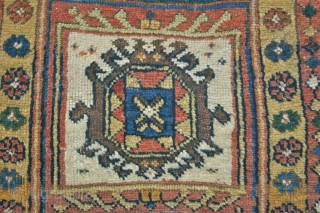 Shaqaqi Kurd Khordjin, (Shahsavan Confederation likely). It has a wonderful drawing, lustrous wool, and beautiful natural dyes. Rather large knots, but nicely woven. Some natural camel wool in the kelim at one  ...