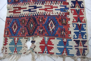 Antique Reyhanli Kelim, circa 1800. Size: 12' x 3'. Condition "as is"; there are various small tears and small holes. The majority of the wear is from the corrosion of the browns,  ...