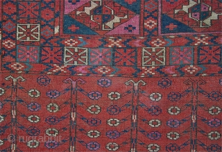 Antique Tekke Aina Gol Chuval / 1.07m. x .72m.
Circa mid 19th c.
Good condition, partial original selvedge, no restoration, just securing of the sides. Extensive use of deeply corroded  magenta silk .  ...