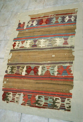 Central Anatolian Banded Kelim Fragment / Natural Camel Stripes
Circa 1800 / possibly earlier? Mounted on beige linen.
Size: 1.45 x .97m.  The kelim has a beautiful deep old rose color,
and the best  ...