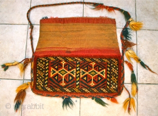 Antique Yomut Torba, (spindle bag?)
Circa Last Qtr. 19th c.
Size: Pile is 51 cm. x 23 cm. Kelim is 49 cm. x 23 cm.
Condition: EXCELLENT, Full Pile, tassels are original and largely intact.
The  ...