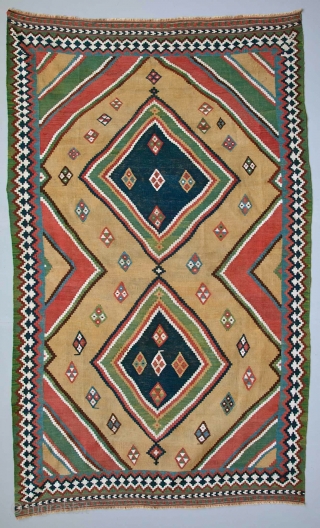  Kashkai Kelim / circa 1875 
 This kelim is in excellent condition, with only a few small re-weaves that are virtually undetectable. Original ends, sides have intermittent re-weaves to green border.
.  ...
