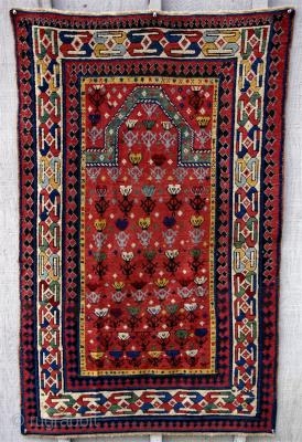 Antique Caucasian Prayer Rug, circa 1870-80. This completely charming little prayer rug, though not far away physically, is a great distance away ''artistically'' from all those late 19th c. Dagestans and Shirvans  ...