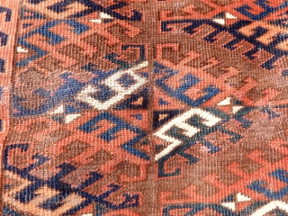 Small Yomud main carpet. Possibly a wedding rug.   Field is full of dyrnak gulls. White, rust, blues and browns compete in this excellent example of Turkoman art. Measures 3ft 6in  ...