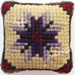 Collection of 5 Old Needlepoint Pincushions. Probably American. 7.5"x6"; 4.5"x4.5"; 3.75"x3.75"; 2.5"x2.5"; 1.75"x1.75". Some moth damage on the largest and the smallest one (as seen in photos) - rest in very good  ...
