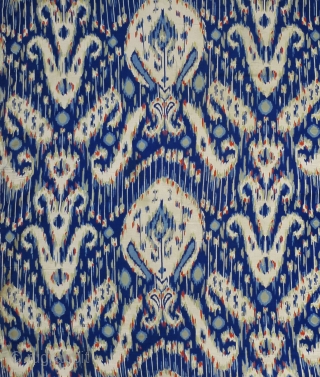 Faux-Ikat Quilt ("Kurpa"). Uzbekistan, circa 1970s. 78" high x 69" wide. Three joined lengths of printed cotton faux-ikat - each 28"x78"(selvedge to selvedge); 27.5"x78"; 13.5"x72". 16" repeat. (The entire length of cloth  ...