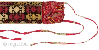 Uzbek (Lakai?) Headband. Uzbekistan, early 20th century. Fine silk cross stitch embroidery; backed with early 20th century Russian printed cotton. 21" x 3.5" (14" embroidery only). Fair condition - some embroidery abrasion;  ...