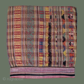 Rare Lao tubeskirt with unusual colors and weave- probably made by a Khmu weaver (non-Tai) to be worn in Xam Neua and identify with the local Tai. Note typically-Tai figures in detail.  ...