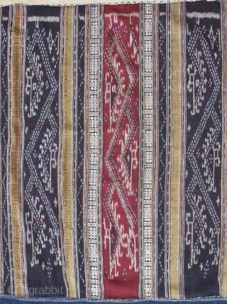 Antique 'Sin Mii' from Laos - River dragons alternate in red silk and indigo ikat panels with flanking supplementary weft patterns in silk.  Condition is very good with only a few  ...