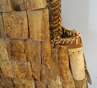 Indonesian warrior Vest from the Toraja people of Sulawesi Island.   Made from water buffalo bone, and sewn together with woven rattan plant fibers. the vest makes great wall display. mid-20th  ...