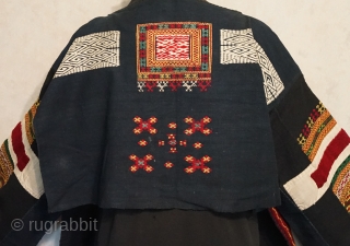 A rare find...Chinese minority festival top from  Nan Dian   90 +  years old 
hand woven cotton fabric with a variety of embroidery techniques using home spun threads...
Jacket is  ...