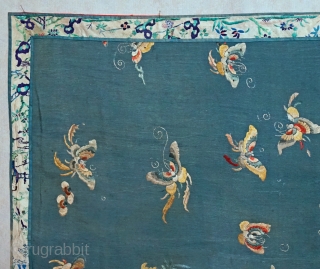 Antique Large Hand Embroidered Chinese silk shawl panel
All over pattern of multiple assorted butterflies...wedgewood blue silk crape fabric surrounded with embroidered border...entire piece is lined with red cotton fabric... 
measures roughly 27  ...