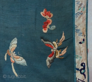 Antique Large Hand Embroidered Chinese silk shawl panel
All over pattern of multiple assorted butterflies...wedgewood blue silk crape fabric surrounded with embroidered border...entire piece is lined with red cotton fabric... 
measures roughly 27  ...