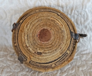 Antique Tibetan woven bowl container.

This woven Tibetan container was used to hold a pair of wooden tea bowls. There is a removable interior separator which allows for the separation of the tea  ...