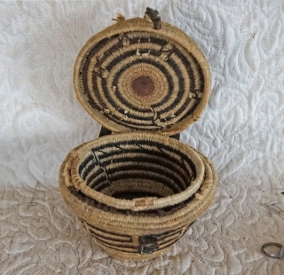 Antique Tibetan woven bowl container.

This woven Tibetan container was used to hold a pair of wooden tea bowls. There is a removable interior separator which allows for the separation of the tea  ...