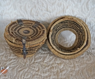 Antique Tibetan woven bowl container.

This woven Tibetan container was used to hold a pair of wooden tea bowls. There is a removable interior separator which allows for the separation of the tea  ...