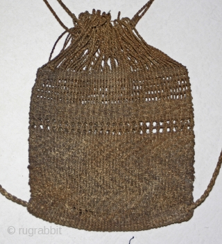 Antique Japanese fisherman's knapsack, backpack...          
This antique Japanese small drawstring fisherman's bag is woven from hand rolled cording using indigenous natural plant fibers.  ...