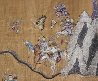 TC375  This antique Chinese silk textile wall hanging is embroidered with mounted soldiers carrying banners across a mountainous terrain. Silk background fabric with a wide silk border, the tapestry is approx  ...