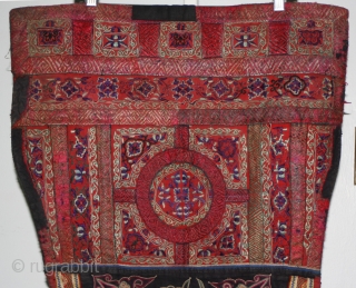 Rare old Shui ethnic minority baby carrier is from Gui Zhou province China. The upper section is elaborately embroidered using mostly satin stitch technique. The lower section is embroidered with a horsehair  ...