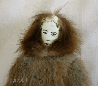 Misc110 Large Old Female Inuit Eskimo Doll
All hand-sewn Eskimo doll probably made sometime during the 60's. She is dressed in nicely detailed fur parka with fox trimmed hood and has hand-painted facial  ...