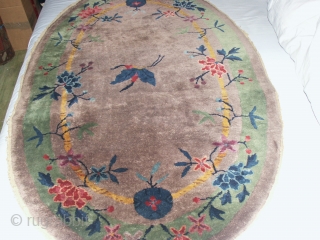 

   Antique  Chinese  rug  93 X 148  cm.
   Superb  naturel  colours,lusterous Wool,
   very  good  condition.    