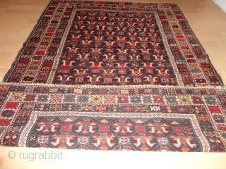   Very  rare  antique  caucasian  birds   Kuba  rug  ,  round  1890
  110 X 157  cm.  Oxydate  black  ...