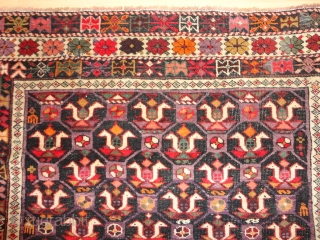   Very  rare  antique  caucasian  birds   Kuba  rug  ,  round  1890
  110 X 157  cm.  Oxydate  black  ...