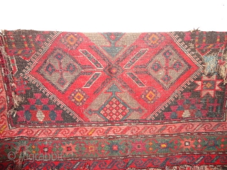   Antique  Kasak with  Armenian  inscription  19 th. century  113 X 193 cm.

  Superb  pattern in  relief on a  total oxidized braun  ...