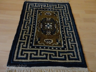 
   Nice  old  chinese  Peking  Baby  rug  56 X 74  cm. , round  1920

   Natural  colors , camel wool  ...