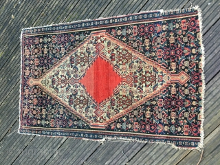 Senneh, kurdish, Antique small rug, FRAGMENT, great colors and very fine waive. Beautiful open field in red. size: approx. 93 cm x 60 cm. A very rare piece.     