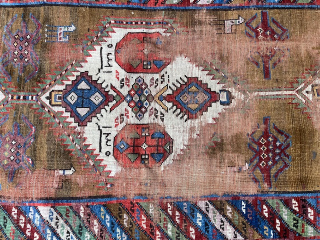 A Bakshaish or Sarab Camel hair runner?
Any details to this piece are welcome.
Very WORN but a very rare piece 
with very soft wool.
The piece is dated and signed but I have no  ...
