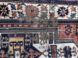 Antique South Caucasian rug, 4' x 6'7, Karabagh region, mid nineteenth century. All wool foundation. Although the rug has a variation of 'Fachralo' or 'Sevan' Kazak medallion design, the black wool wefting  ...