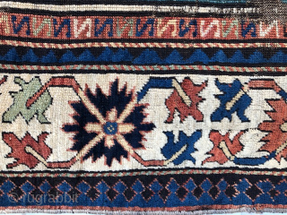 Antique South Caucasian rug, 4' x 6'7, Karabagh region, mid nineteenth century. All wool foundation. Although the rug has a variation of 'Fachralo' or 'Sevan' Kazak medallion design, the black wool wefting  ...