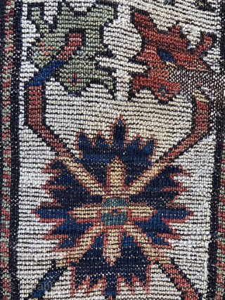 Antique South Caucasian rug, 4' x 6'7, Karabagh region, mid nineteenth century. All wool foundation. Although the rug has a variation of 'Fachralo' or 'Sevan' Kazak medallion design, the black wool wefting  ...