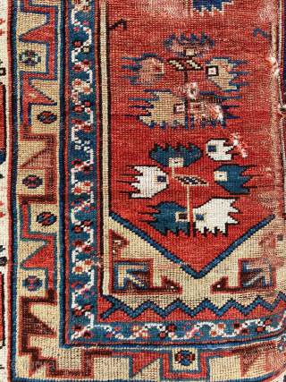 Antique West Anatolian rug, 4' x 6'2, Makri region, mid nineteenth century or earlier. Scattered areas of wear and damage with losses to the ends and sides (see photos). More than half  ...