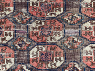 Antique Chodor Turkmen main carpet, 6'8 x 8'6, first half of the nineteenth century. A field of classic Chodor 'Tauk Nuska' guls with 'chuval gul' minor elements. An early example as indicated  ...