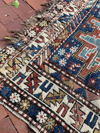Antique East Caucasian Dagestan rug with Lesghi star design, 3'4 x 4'8. Low even pile with some areas a wear and corrosion of black in the central star and adjacent borders. Natural  ...