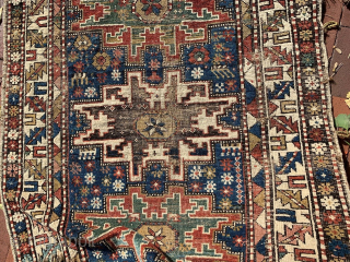 Antique East Caucasian Dagestan rug with Lesghi star design, 3'4 x 4'8. Low even pile with some areas a wear and corrosion of black in the central star and adjacent borders. Natural  ...