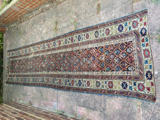 Antique Kuba runner, dated 1842. Good condition. Missing ends at top and bottom. Otherwise nice pile. Some localised wear in central field. Pile thick throughout around border. Worldwide shipping $45 unless ...