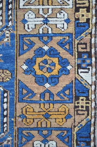 East Caucasian carpet with twelve Oktagon medallions and beautiful Kufi Border, possibly Konagkend, 209 x 120 cm, even low pile             